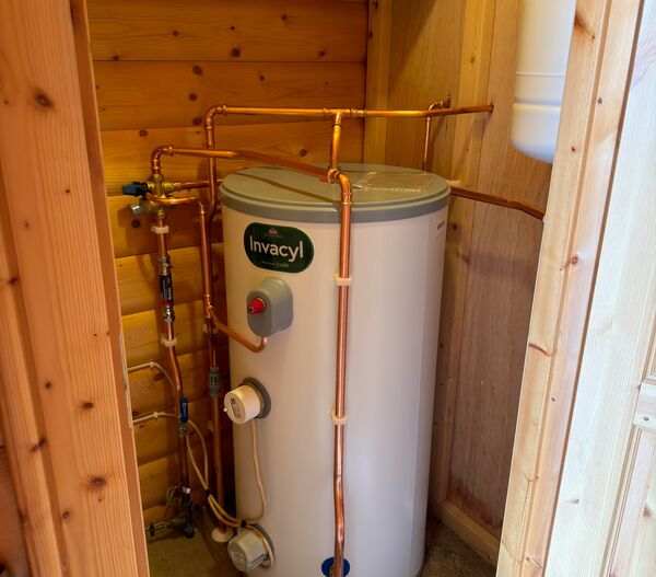 Water heater and copper piping installed by Tidemark Plumbing