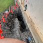 Why Sewer Lines Back Up During Storms and King Tides
