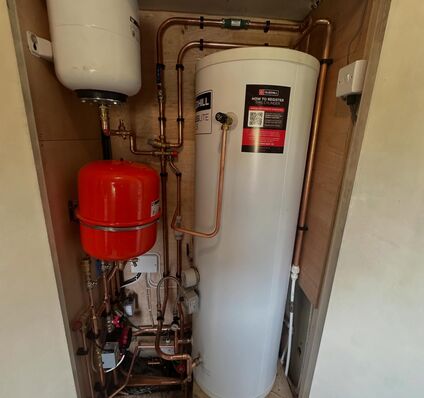 Utility Closet Water Heater & Expansion Tank Upgrade — photo 1