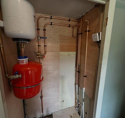 Utility Closet Water Heater & Expansion Tank Upgrade — photo 2