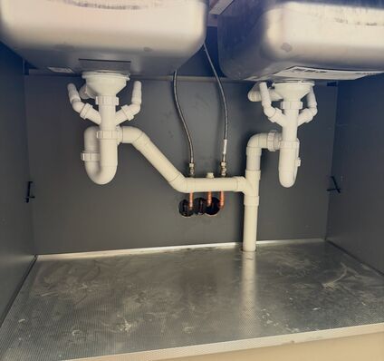 Kitchen Sink & Powder Room Plumbing — photo 1