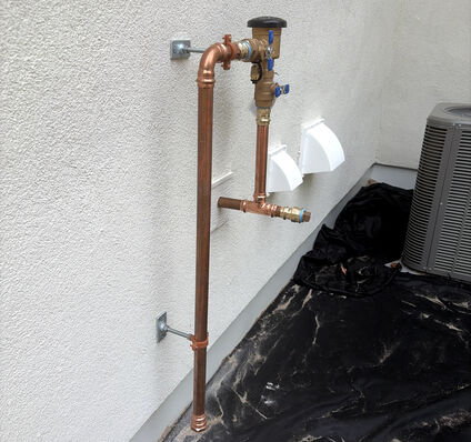 PEX Manifold, Backflow & Water Heater Rough-In — photo 2