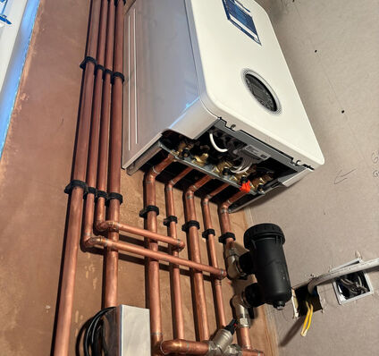 Wall-Hung Boiler & Copper Manifold Install — photo 1
