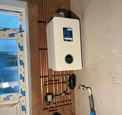 Wall-Hung Boiler & Copper Manifold Install — photo 2